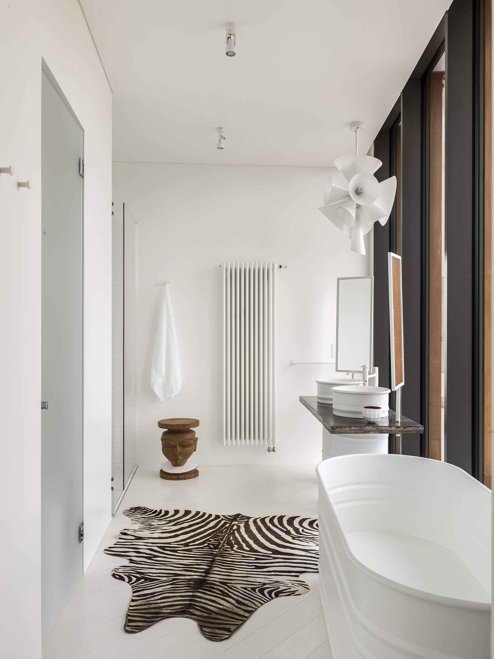 The bathrooms exhibit a similar design aesthetic as the rest of the home | Moscow Home| Anna Erman| STIRworld